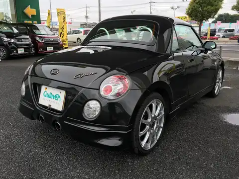 カタログ画像：コペン （COPEN） １０ｔｈアニバーサリーエディション 2012年4月 ABA-L880K 660cc ＤＣ・ブラックマイカメタリック 燃費15.2km / l バック