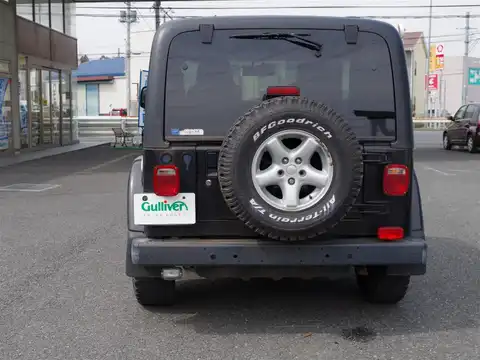 カタログ画像：ジープ・ラングラー （JEEP WRANGLER） サハラ 2004年12月 GH-TJ40S 4000cc ブラッククリアコート 燃費6.2km / l バック