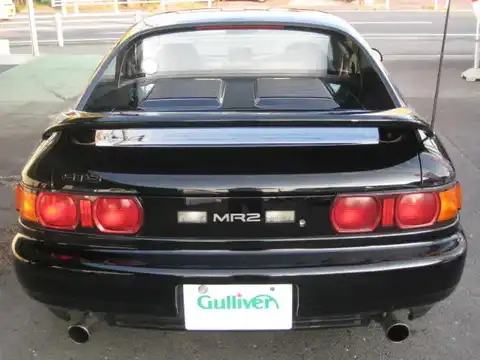カタログ画像：ＭＲ２ （MR2） ＧＴ－Ｓ Ｔバールーフ仕様車 1996年6月 E-SW20 2000cc ブラック 燃費10.6km / l バック