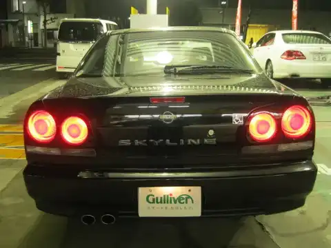 カタログ画像：スカイライン （SKYLINE） ２５ＧＴ－Ｘ ＦＯＵＲ 1998年5月 GF-ENR34 2500cc ブラックパール 燃費9.2km / l バック