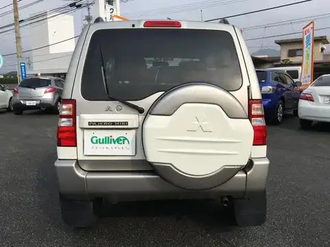 カタログ画像：パジェロミニ （PAJERO MINI） サウンドビートエディションＸＲ 2004年4月 TA-H58A 660cc ミディアムシルバーメタリック／ホワイトソリッド／ミディアムシルバーメタリック・３ウェイ２トーン or ミディアムシルバーメタリック／ミディアムブルーマイカ／ミディアムシルバーメタリック・３ウェイ２トーン バック