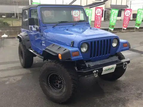 カタログ画像：ジープ・ラングラー （JEEP WRANGLER） スポーツ ソフトトップ 1996年11月 E-TJ40S 4000cc ラピスブルー 燃費7.1km / l メイン（その他）