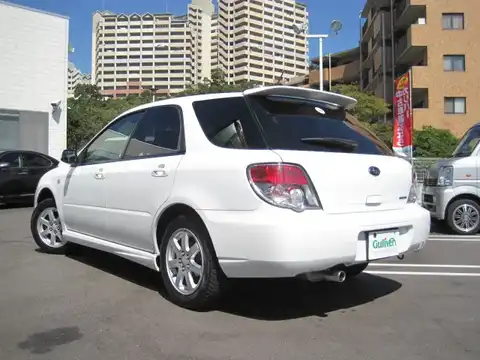 カタログ画像：インプレッサスポーツワゴン （IMPREZA SPORTS WAGON） １．５ｉ 2006年6月 TA-GG3 1500cc ピュアホワイト 燃費13.4km / l バック