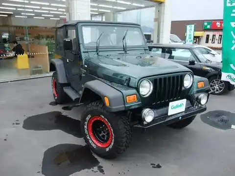 カタログ画像：ジープ・ラングラー （JEEP WRANGLER） スポーツ５ＭＴ 2001年11月 GF-TJ40S 4000cc フォレストグリーンパールコート 燃費6.8km / l メイン（その他）