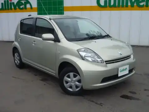 カタログ画像：パッソ （PASSO） Ｘ 2004年6月 DBA-KGC15 1000cc シャンパンメタリックオパール 燃費18.4km / l メイン（その他）