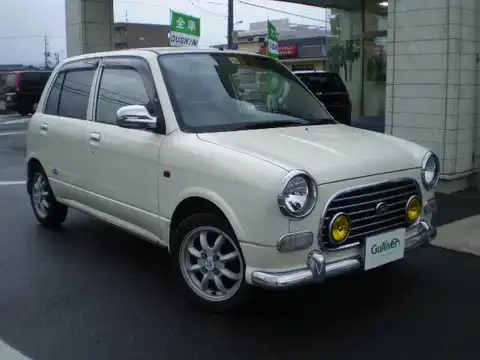 カタログ画像：ミラジーノ （MIRA GINO） ミニライトスペシャルターボ 2004年6月 ABA-L700S 660cc パールホワイトI 燃費20.0km / l メイン（その他）