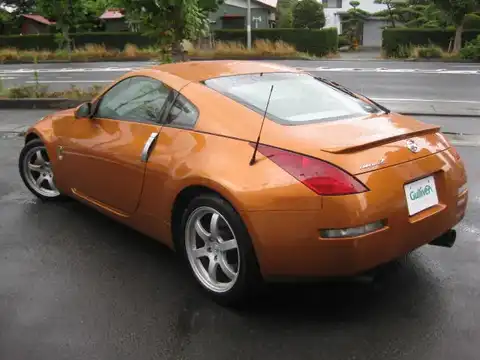 カタログ画像：フェアレディＺ （FAIRLADY Z） バージョンＳＴ 2004年9月 CBA-Z33 3500cc サンセットオレンジ（ＰＭ） 燃費9.0km / l バック