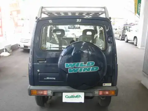 カタログ画像：ジムニー （JIMNY） ハードトップ ＸＣ 1995年11月 E-JA22W 660cc スキューバブルーメタリック 燃費15.8km / l バック