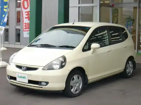 カタログ画像：フィット （FIT） Ｗ 2001年7月 LA-GD2 1300cc オーキッドイエロー 燃費20.0km / l フロント