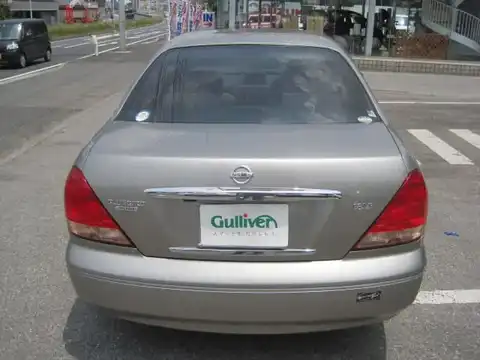 カタログ画像：ブルーバードシルフィ （BLUEBIRD SYLPHY） １８Ｖｉ ７０ｔｈ 2003年5月 UA-QG10 1800cc チタニウムシルバー（Ｍ） 燃費16.0km / l バック