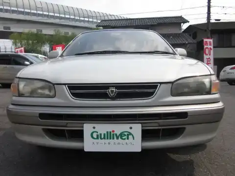 カタログ画像：カローラ （COROLLA） ＳＥサルーン Ｇパッケージ ３０周年記念車 1996年9月 E-AE110 1500cc ウォームグレーパールメタリック 燃費14.6km / l フロント