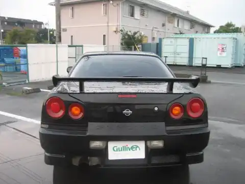 カタログ画像：スカイライン （SKYLINE） ２５ＧＴ 1998年5月 GF-ER34 2500cc ブラックパール 燃費10.6km / l バック