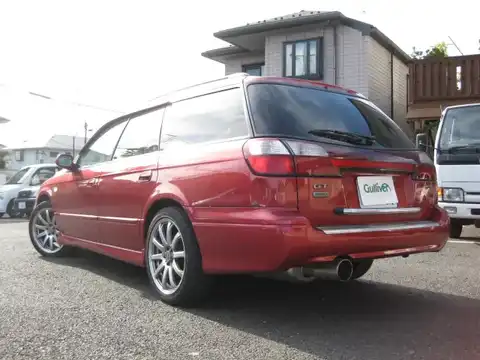 カタログ画像：レガシィツーリングワゴン （LEGACY TOURING WAGON） ＧＴ－ＶＤＣ 1999年5月 GF-BH5 2000cc シャイニーレッド・マイカ 燃費10.6km / l バック