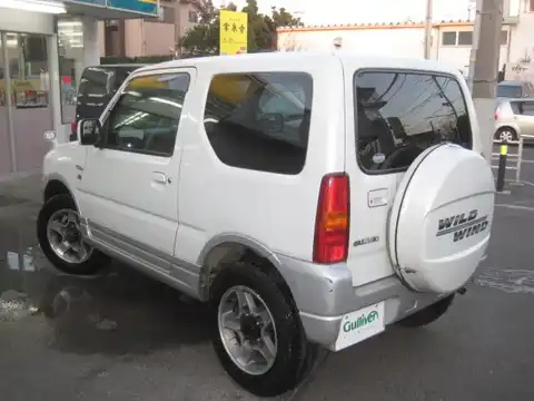 カタログ画像：ジムニー （JIMNY） ワイルドウインド 2002年5月 TA-JB23W 660cc パールホワイト２／シルキーシルバーメタリック 燃費14.8km / l 外装