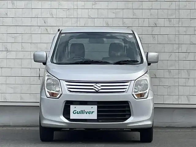 スズキ ワゴンＲ FX 岩手県 2014(平26)年 6.9万km シルキーシルバーメタリック 禁煙車/4WD/純正オーディオ/→CD/FM/AM/AUX/運転席シートヒーター/電動格納ミラー/冬タイヤホイール車載/〇ドアバイザー/〇フロアマット/〇取扱説明書