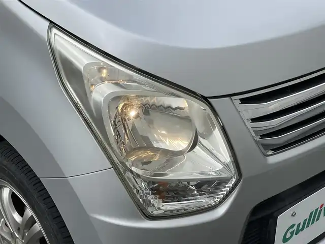 スズキ ワゴンＲ FX 岩手県 2014(平26)年 6.9万km シルキーシルバーメタリック 禁煙車/4WD/純正オーディオ/→CD/FM/AM/AUX/運転席シートヒーター/電動格納ミラー/冬タイヤホイール車載/〇ドアバイザー/〇フロアマット/〇取扱説明書