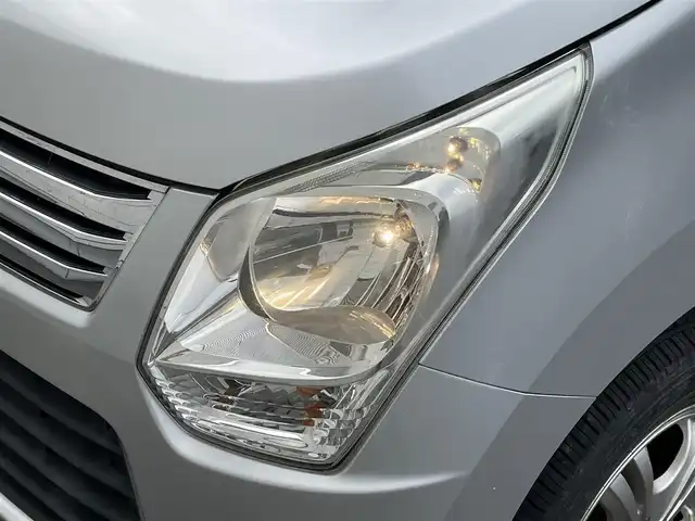 スズキ ワゴンＲ FX 岩手県 2014(平26)年 6.9万km シルキーシルバーメタリック 禁煙車/4WD/純正オーディオ/→CD/FM/AM/AUX/運転席シートヒーター/電動格納ミラー/冬タイヤホイール車載/〇ドアバイザー/〇フロアマット/〇取扱説明書