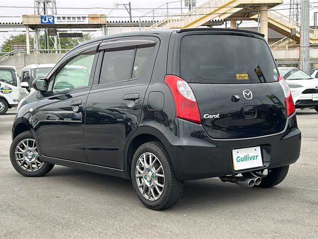 マツダ キャロル GS 山口県 2014(平26)年 6.9万km ブルーイッシュブラックパール3 純正７型ナビ/・ワンセグTV/・CD/社外マフラー/バックカメラ/社外14インチアルミホイール/リモコンキー/スペアキー１本/ドアバイザー/純正フロアマット/純正マフラー積込/保証書/取扱説明書
