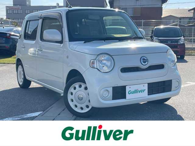 ダイハツ ミラ ココア X 滋賀県 2016(平28)年 10.6万km パールホワイトⅢ ワンオーナー/社外ナビ/・ワンセグ/CD/シートリフター/電動格納ミラー/アイドリングストップ/14インチAW付スタッドレスタイヤ積載/スマートキー