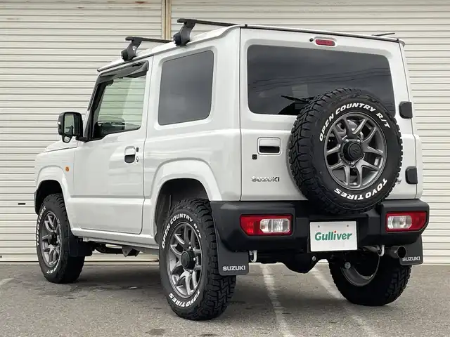 スズキ ジムニー XC 新潟県 2023(令5)年 0.3万km ピュアホワイトP ワンオーナー/衝突軽減/社外マフラー(純正積み込み)/社外ナビ/(AM/FM/CD/DVD/BT/フルセグ)/ETC/社外ドライブレコーダー(前)/クルーズコントロール/アイドリングストップ/シートヒーター/革巻きステアリング/ステアリングスイッチ/AUTOライト/LEDヘッドライト/フォグランプ/プッシュスタート/スマートキー/シートカバー(前のみ)/社外フロアマット