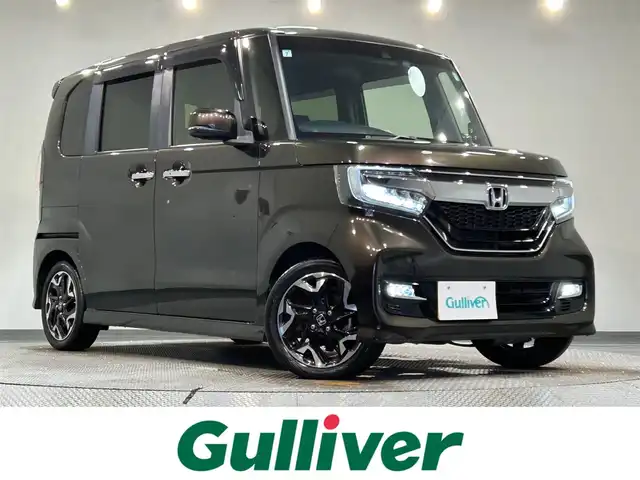 ホンダ Ｎ ＢＯＸ カスタム G L ターボ ホンダセンシング 愛知県 2019(令1)年 7.8万km プレミアムグラマラスブロンズP 純正８インチナビ　/（Bluetooth/フルセグTV/AM/FM/CD/DVD/SD/USB）/衝突軽減ブレーキ　/両側電動スライドドア　/レーダークルーズコントロール　/ＬＥＤヘッドライト　/ＥＴＣ　/前後ドライブレコーダー　/コーナーセンサー　/レーンキープアシスト　/プッシュスタート/ＵＳＢ接続　/スペアキー/スマートキー/ミュージックサーバー/ミュージックプレイヤー接続/純正フロアマット/純正15インチアルミホイール/オートライト