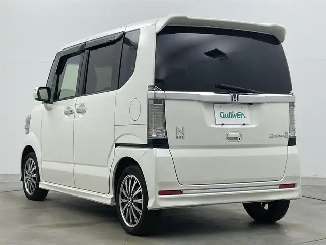 ホンダ Ｎ ＢＯＸ カスタム G ターボ Lパッケージ 岡山県 2016(平28)年 9.1万km プレミアムホワイトパールⅡ 純正ナビ（VXM-165VFi）/【フルセグ/BM/FM/USB】/両側パワースライドドア/クルーズコントロール/バックカメラ/ビルトインＥＴＣ/衝突軽減ブレーキ/オートライト/ＬＥＤヘッドライト/社外ドライブレコーダー(前後)/純正アルミホイール/パドルシフト/シートバックテーブル/ISOFIX