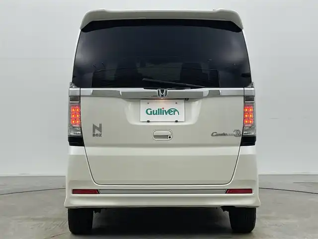 ホンダ Ｎ ＢＯＸ カスタム G ターボ Lパッケージ 岡山県 2016(平28)年 9.1万km プレミアムホワイトパールⅡ 純正ナビ（VXM-165VFi）/【フルセグ/BM/FM/USB】/両側パワースライドドア/クルーズコントロール/バックカメラ/ビルトインＥＴＣ/衝突軽減ブレーキ/オートライト/ＬＥＤヘッドライト/社外ドライブレコーダー(前後)/純正アルミホイール/パドルシフト/シートバックテーブル/ISOFIX