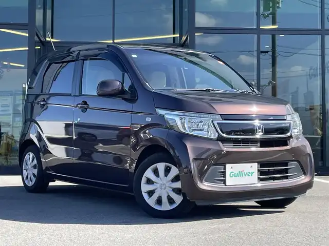 ホンダ Ｎ ＷＧＮ G Aパッケージ 愛媛県 2015(平27)年 6.7万km プレミアムディープモカパール CTBA（衝突被害軽減ブレーキ）/純正7インチナビ（CD/DVD/Bluetooth）/ワンセグTV/バックカメラ/ステアリングスイッチ/プッシュスタート/オートライト/HIDヘッドライト/ベンチシート/純正フロアマット/スペアキー/ABS/横滑り防止装置/カーテンエアバッグ
