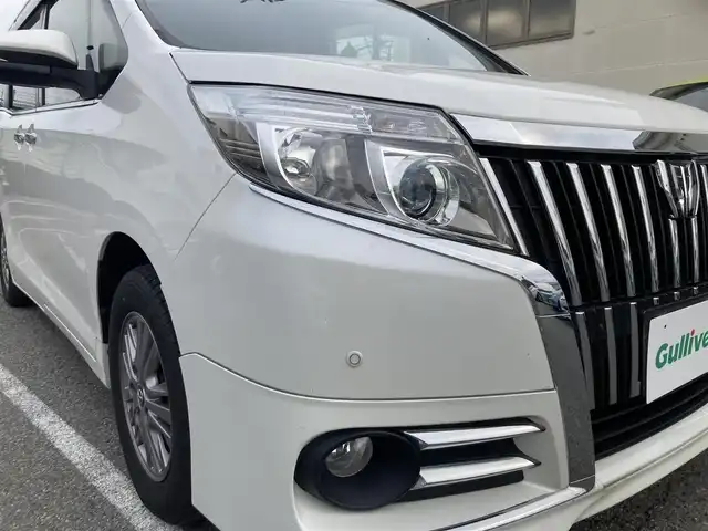 トヨタ エスクァイア Gi 兵庫県 2016(平28)年 7.9万km ホワイトパールクリスタルシャイン 純正SDナビ/フルセグTV/Bluetooth/AM/FM/CD/DVD/両側電動スライドドア/ETC/衝突被害軽減ブレーキ/車線逸脱防止/クルーズコントロール/シートヒーター/コーナーセンサー/オートハイビーム/スマートキー/電動格納ミラー/純正フロアマット/スタッドレスタイヤ積み込み/革巻きステアリング