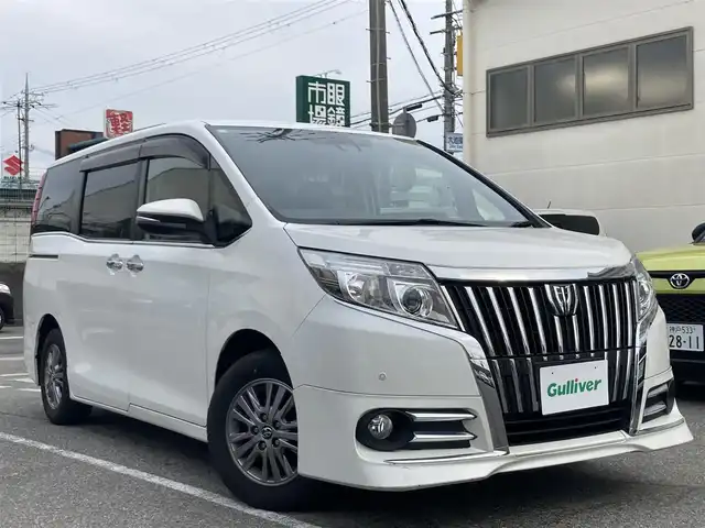 トヨタ エスクァイア Gi 兵庫県 2016(平28)年 7.9万km ホワイトパールクリスタルシャイン 純正SDナビ/フルセグTV/Bluetooth/AM/FM/CD/DVD/両側電動スライドドア/ETC/衝突被害軽減ブレーキ/車線逸脱防止/クルーズコントロール/シートヒーター/コーナーセンサー/オートハイビーム/スマートキー/電動格納ミラー/純正フロアマット/スタッドレスタイヤ積み込み/革巻きステアリング