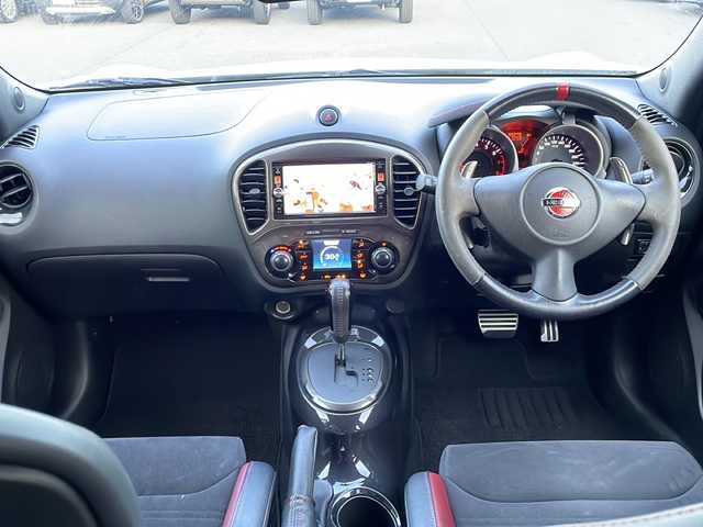 日産 ジューク ニスモ RS 道東・釧路十勝 2015(平27)年 10万km ホワイト 純正ナビ(AM/FM/CD/DVD/BT/SD/フルセグ)/ETC/全方位バックカメラ/社外マフラー(カキモト)/パドルシフト/4WDセレクタースイッチ/ハーフレザー/ドラレコ前後/オートライト/横滑り防止/電格ミラー/プッシュスタート