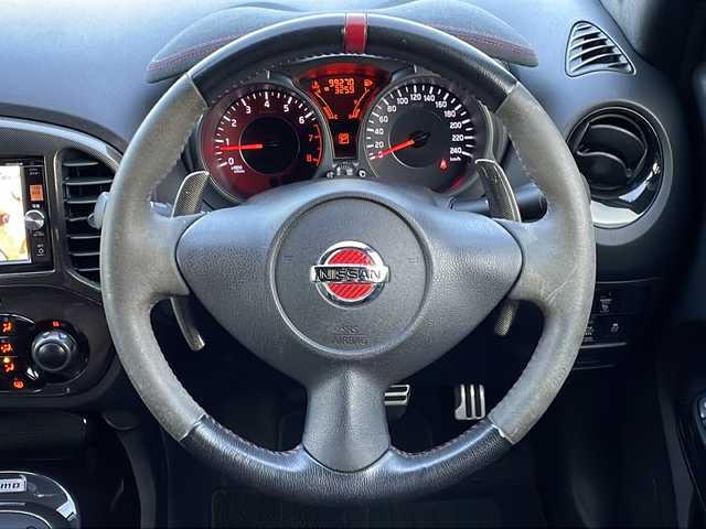 日産 ジューク ニスモ RS 道東・釧路十勝 2015(平27)年 10万km ホワイト 純正ナビ(AM/FM/CD/DVD/BT/SD/フルセグ)/ETC/全方位バックカメラ/社外マフラー(カキモト)/パドルシフト/4WDセレクタースイッチ/ハーフレザー/ドラレコ前後/オートライト/横滑り防止/電格ミラー/プッシュスタート