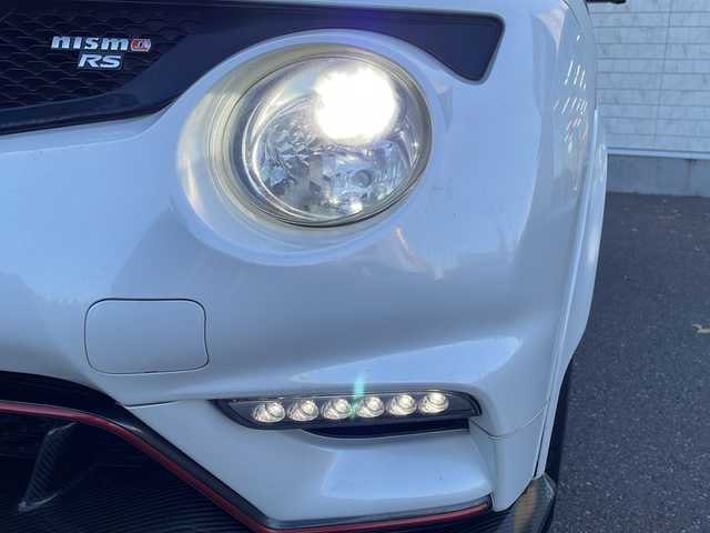 日産 ジューク ニスモ RS 道東・釧路十勝 2015(平27)年 10万km ホワイト 純正ナビ(AM/FM/CD/DVD/BT/SD/フルセグ)/ETC/全方位バックカメラ/社外マフラー(カキモト)/パドルシフト/4WDセレクタースイッチ/ハーフレザー/ドラレコ前後/オートライト/横滑り防止/電格ミラー/プッシュスタート