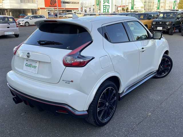 日産 ジューク ニスモ RS 道東・釧路十勝 2015(平27)年 10万km ホワイト 純正ナビ(AM/FM/CD/DVD/BT/SD/フルセグ)/ETC/全方位バックカメラ/社外マフラー(カキモト)/パドルシフト/4WDセレクタースイッチ/ハーフレザー/ドラレコ前後/オートライト/横滑り防止/電格ミラー/プッシュスタート