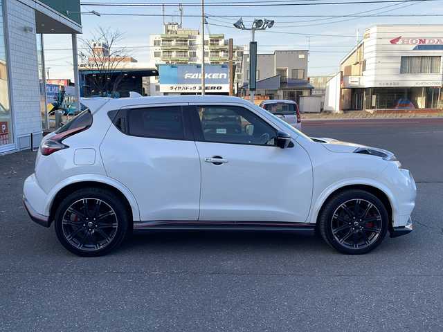 日産 ジューク ニスモ RS 道東・釧路十勝 2015(平27)年 10万km ホワイト 純正ナビ(AM/FM/CD/DVD/BT/SD/フルセグ)/ETC/全方位バックカメラ/社外マフラー(カキモト)/パドルシフト/4WDセレクタースイッチ/ハーフレザー/ドラレコ前後/オートライト/横滑り防止/電格ミラー/プッシュスタート