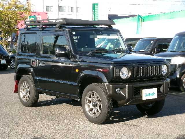 スズキ ジムニー XC 岡山県 2022(令4)年 4.5万km ブルーイッシュブラックパール3 【 SUZUKI Safety Support 】/・デュアルセンサーブレーキサポート/・誤発進抑制機能/・車線逸脱警報/・ふらつき警報/・先行車発進お知らせ機能/・標識認識機能/社外フロントグリル/リアラダー/ルーフキャリア/ディスプレイオーディオ/バックカメラ/Bluetooth/DVD再生可能/前席シートヒーター/クルーズコントロール/LEDヘッドライト/オートライト/ビルトインETC/社外フロアマット/純正16AW/スマートキー2個/取説・保証書