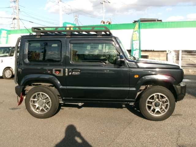 スズキ ジムニー XC 岡山県 2022(令4)年 4.5万km ブルーイッシュブラックパール3 【 SUZUKI Safety Support 】/・デュアルセンサーブレーキサポート/・誤発進抑制機能/・車線逸脱警報/・ふらつき警報/・先行車発進お知らせ機能/・標識認識機能/社外フロントグリル/リアラダー/ルーフキャリア/ディスプレイオーディオ/バックカメラ/Bluetooth/DVD再生可能/前席シートヒーター/クルーズコントロール/LEDヘッドライト/オートライト/ビルトインETC/社外フロアマット/純正16AW/スマートキー2個/取説・保証書