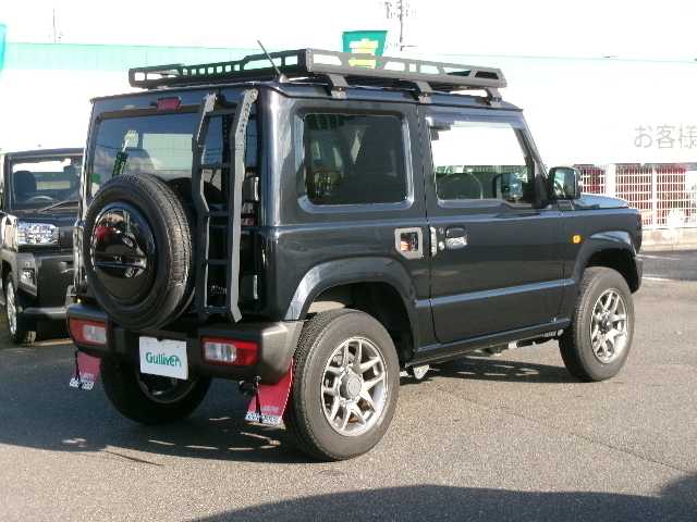 スズキ ジムニー XC 岡山県 2022(令4)年 4.5万km ブルーイッシュブラックパール3 【 SUZUKI Safety Support 】/・デュアルセンサーブレーキサポート/・誤発進抑制機能/・車線逸脱警報/・ふらつき警報/・先行車発進お知らせ機能/・標識認識機能/社外フロントグリル/リアラダー/ルーフキャリア/ディスプレイオーディオ/バックカメラ/Bluetooth/DVD再生可能/前席シートヒーター/クルーズコントロール/LEDヘッドライト/オートライト/ビルトインETC/社外フロアマット/純正16AW/スマートキー2個/取説・保証書