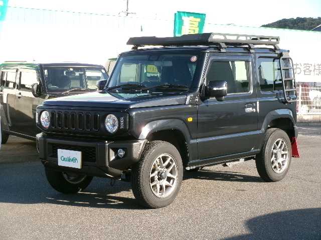 スズキ ジムニー XC 岡山県 2022(令4)年 4.5万km ブルーイッシュブラックパール3 【 SUZUKI Safety Support 】/・デュアルセンサーブレーキサポート/・誤発進抑制機能/・車線逸脱警報/・ふらつき警報/・先行車発進お知らせ機能/・標識認識機能/社外フロントグリル/リアラダー/ルーフキャリア/ディスプレイオーディオ/バックカメラ/Bluetooth/DVD再生可能/前席シートヒーター/クルーズコントロール/LEDヘッドライト/オートライト/ビルトインETC/社外フロアマット/純正16AW/スマートキー2個/取説・保証書