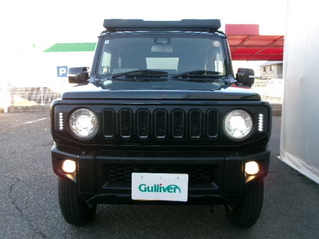 スズキ ジムニー XC 岡山県 2022(令4)年 4.5万km ブルーイッシュブラックパール3 【 SUZUKI Safety Support 】/・デュアルセンサーブレーキサポート/・誤発進抑制機能/・車線逸脱警報/・ふらつき警報/・先行車発進お知らせ機能/・標識認識機能/社外フロントグリル/リアラダー/ルーフキャリア/ディスプレイオーディオ/バックカメラ/Bluetooth/DVD再生可能/前席シートヒーター/クルーズコントロール/LEDヘッドライト/オートライト/ビルトインETC/社外フロアマット/純正16AW/スマートキー2個/取説・保証書