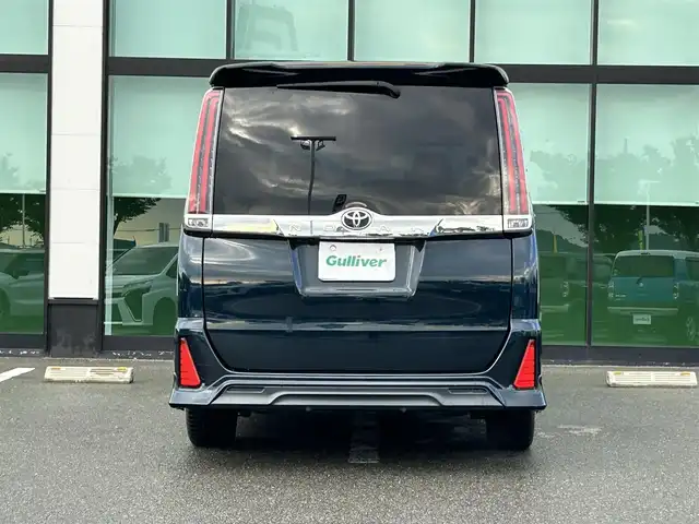 トヨタ ノア Si 和歌山県 2017(平29)年 6.8万km ブラッキッシュアゲハガラスフレーク ALPINE10インチナビ/フルセグTV/Bluetooth/CD/DVD/USB/バックカメラ/ETC/ドライブレコーダー/衝突軽減カメラ/車線逸脱防止機能/クルーズコントロール/サンルーフ/両側パワースライドドア/モデリスタエアロ/革巻きステアリング/ステアリングスイッチ/LEDヘッドライト/フォグランプ/オートライト/オートハイビーム/アイドリングストップ/純正16インチAW/ドアバイザー/プッシュスタート/スマートキー