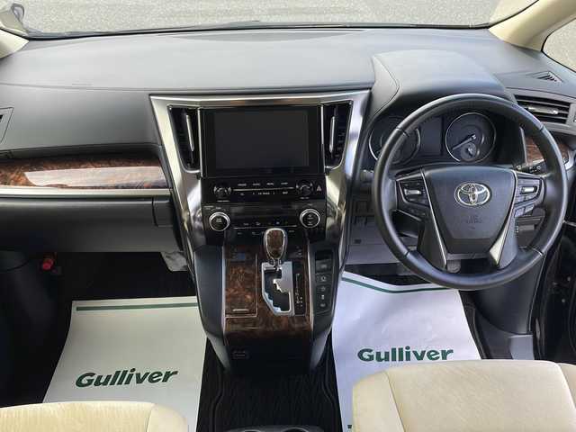 トヨタ アルファード X 岩手県 2022(令4)年 6.6万km ブラック 純正9.8インチディスプレイオーディオナビ/AM/FM/Bluetooth/バックカメラ/ETC/両側パワースライドドア/レーダークルーズコントロール/衝突被害軽減ブレーキ/レーンキープアシスト/横滑り防止装置/コーナーセンサー/アイドリングストップ/オートライト/オートハイビーム/LEDヘッドライト/フォグランプ/スマートキー/プッシュスタート/電動格納ミラー/純正16インチAW/8人乗り/ドアバイザー/禁煙車