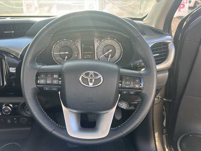 トヨタ ハイラックス Z 愛知県 2021(令3)年 1.5万km オキサイドブロンズM 禁煙車/純正メモリナビ/　AM/FM/BT/USB/HDMI/DISC/フルセグTV/GRフロントエアロ/GRサイドステップ/社外ドライブレコーダー/前後クリアランスソナー/追従機能付きクルーズコントロール/レーンキープアシスト/ダウンヒルアシストコントロール/センターデフロック/アイドリングストップ/オートライト/LEDヘッドライト/フォグランプ/ETC/純正１７インチAW/純正フロアマット/純正ドアバイザー/横滑り防止装置/盗難防止装置/革巻きステアリング/ステアリングスイッチ/W＋サイドエアバッグ/保証書/取説/スペアキー