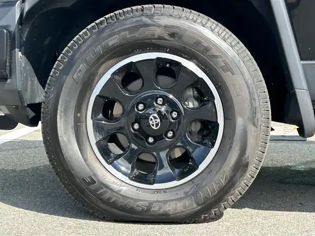 トヨタ ＦＪクルーザー ブラックカラーパッケージ 和歌山県 2017(平29)年 7万km ブラック/ホワイト 純正7インチナビ/フルセグTV/Bluetooth/CD/DVD/バックカメラ/ETC/パーキングソナー/社外グリルガード/ガッツミラー/ガナドールマフラー/ブロックタイヤ積み込み/ヘッドライトレベライザー/横滑り防止機能/リモコンキー/スペアキー