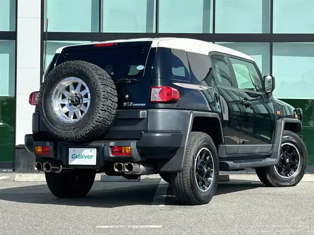 トヨタ ＦＪクルーザー ブラックカラーパッケージ 和歌山県 2017(平29)年 7万km ブラック/ホワイト 純正7インチナビ/フルセグTV/Bluetooth/CD/DVD/バックカメラ/ETC/パーキングソナー/社外グリルガード/ガッツミラー/ガナドールマフラー/ブロックタイヤ積み込み/ヘッドライトレベライザー/横滑り防止機能/リモコンキー/スペアキー