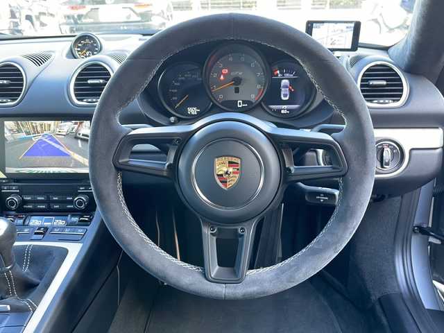 ポルシェ ７１８ケイマン GT4 大阪府 2020(令2)年 0.6万km シルバー 純正ナビ【JukeBox/BlueTooth】/BOSEプレミアムサウンド/カーボンフルバケシート/アイドリングストップ/ドライブレコーダー/レーダー探知機/オートブリッピング/スポーツエキゾーストシステム/ETC2.0