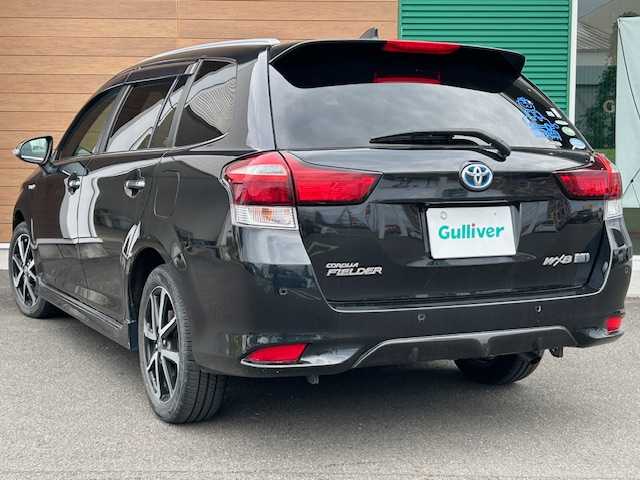 トヨタ カローラ フィールダー ハイブリッドG ダブルバイビー 静岡県 2018(平30)年 4.6万km ブラックマイカ ハイブリッド/トヨタ純正ナビ/（フルセグTV/ Bluetooth/ CD/ FM/ AM)/ビルトインETC/純正16inAW/ハーフレザーシート/前席シートヒーター/プッシュスタート/スマートキー/ドアバイザー/LEDヘッドライト/クリアランスソナー/オートライト/オートマチックハイビーム/保証書/取扱説明書