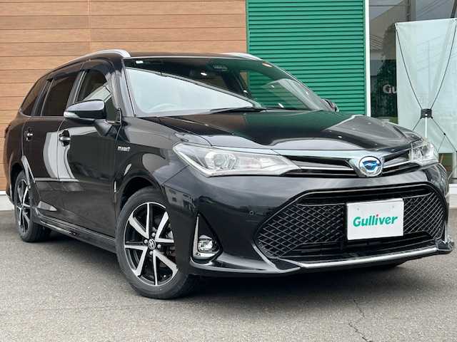 トヨタ カローラ フィールダー ハイブリッドG ダブルバイビー 静岡県 2018(平30)年 4.6万km ブラックマイカ ハイブリッド/トヨタ純正ナビ/（フルセグTV/ Bluetooth/ CD/ FM/ AM)/ビルトインETC/純正16inAW/ハーフレザーシート/前席シートヒーター/プッシュスタート/スマートキー/ドアバイザー/LEDヘッドライト/クリアランスソナー/オートライト/オートマチックハイビーム/保証書/取扱説明書