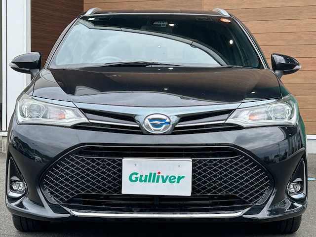 トヨタ カローラ フィールダー ハイブリッドG ダブルバイビー 静岡県 2018(平30)年 4.6万km ブラックマイカ ハイブリッド/トヨタ純正ナビ/（フルセグTV/ Bluetooth/ CD/ FM/ AM)/ビルトインETC/純正16inAW/ハーフレザーシート/前席シートヒーター/プッシュスタート/スマートキー/ドアバイザー/LEDヘッドライト/クリアランスソナー/オートライト/オートマチックハイビーム/保証書/取扱説明書