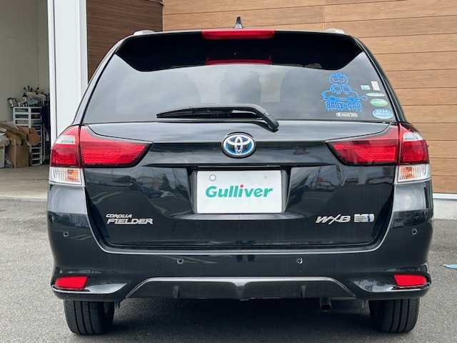 トヨタ カローラ フィールダー ハイブリッドG ダブルバイビー 静岡県 2018(平30)年 4.6万km ブラックマイカ ハイブリッド/トヨタ純正ナビ/（フルセグTV/ Bluetooth/ CD/ FM/ AM)/ビルトインETC/純正16inAW/ハーフレザーシート/前席シートヒーター/プッシュスタート/スマートキー/ドアバイザー/LEDヘッドライト/クリアランスソナー/オートライト/オートマチックハイビーム/保証書/取扱説明書